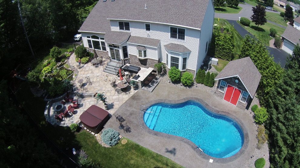 Mystic Granite for a Contemporary Spaces with a Bluestone Patios and Aerial by Pearl Landscaping & Patio Company