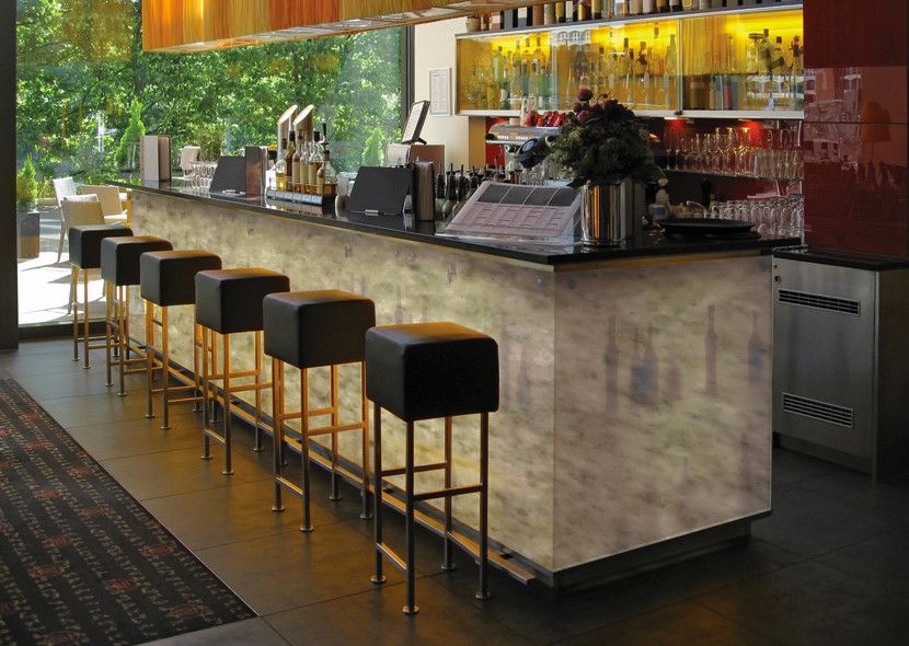 Mystic Granite for a Modern Home Bar with a Iceberg and Exotic Stone Installs by Mystic Granite & Marble