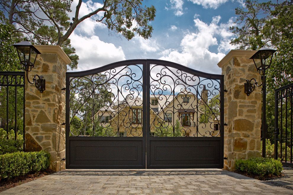 Natec for a Mediterranean Landscape with a Brick Driveway and Exterior by Allan Edwards Builder Inc