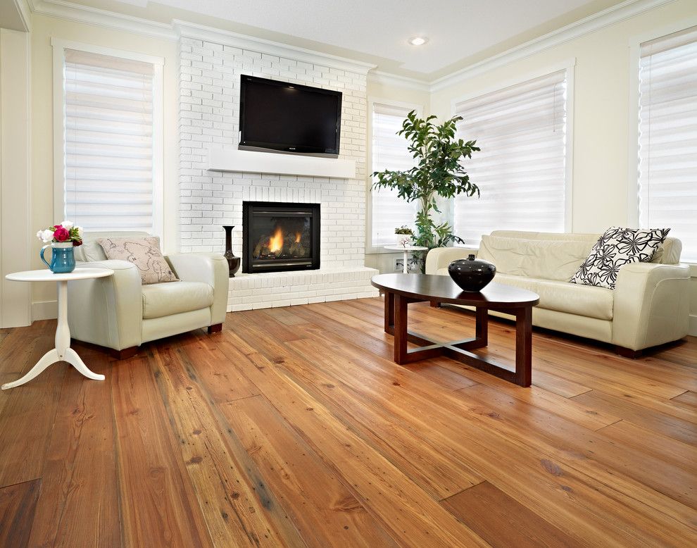 Navajo White Paint for a Contemporary Family Room with a White Window Treatment and Design by Sarasota Homes Ltd.