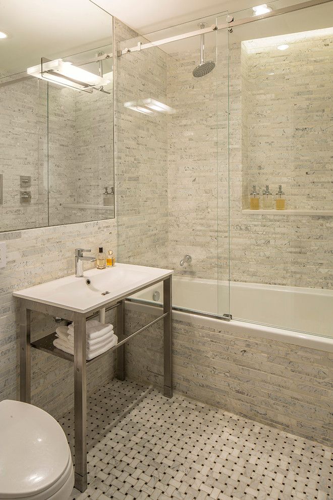 Nemo Tile for a Contemporary Bathroom with a Ceiling Mount Shower Head and London Terrace Penthouse by Ira Frazin Architect