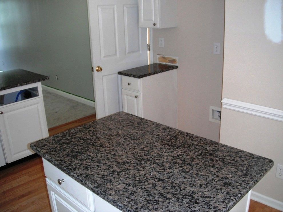 New Caledonia Granite for a Traditional Kitchen with a Caledonia Granite and Caledonia Granite for White Cabinets by Fireplace & Granite Distributors