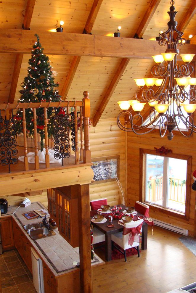 Niblock Homes for a Rustic Family Room with a Merry Christmas and Timber Block Log Home Photos by Timber Block Homes