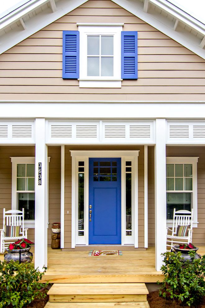 Nichiha for a Beach Style Porch with a Covered Porch and Front Doors by Glenn Layton Homes