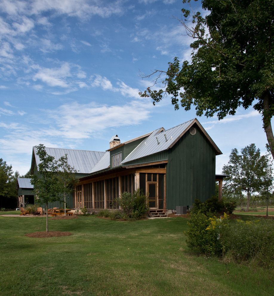 Nichols Lumber for a Farmhouse Exterior with a Cross Gable Roof and Sunflower Farm Cabin by Beard + Riser Architects