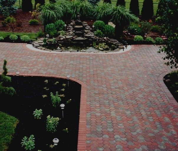Nicolock Pavers for a  Spaces with a Icpi and Paver Patios by Kingdom Landscaping