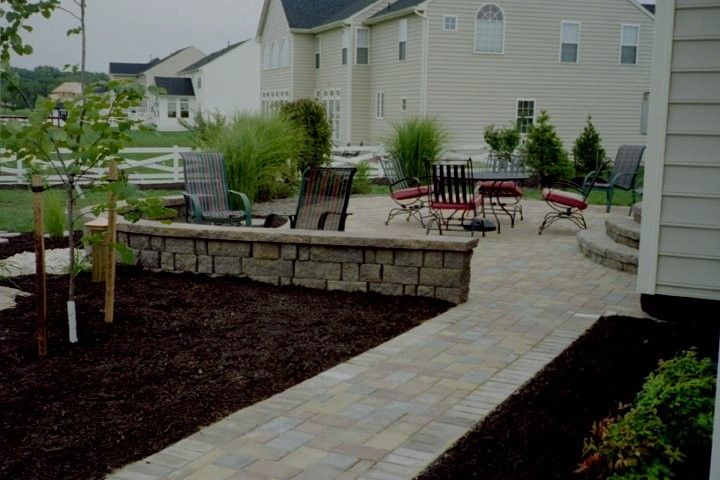 Nicolock Pavers for a  Spaces with a Paver Driveways and Paver Patios by Kingdom Landscaping