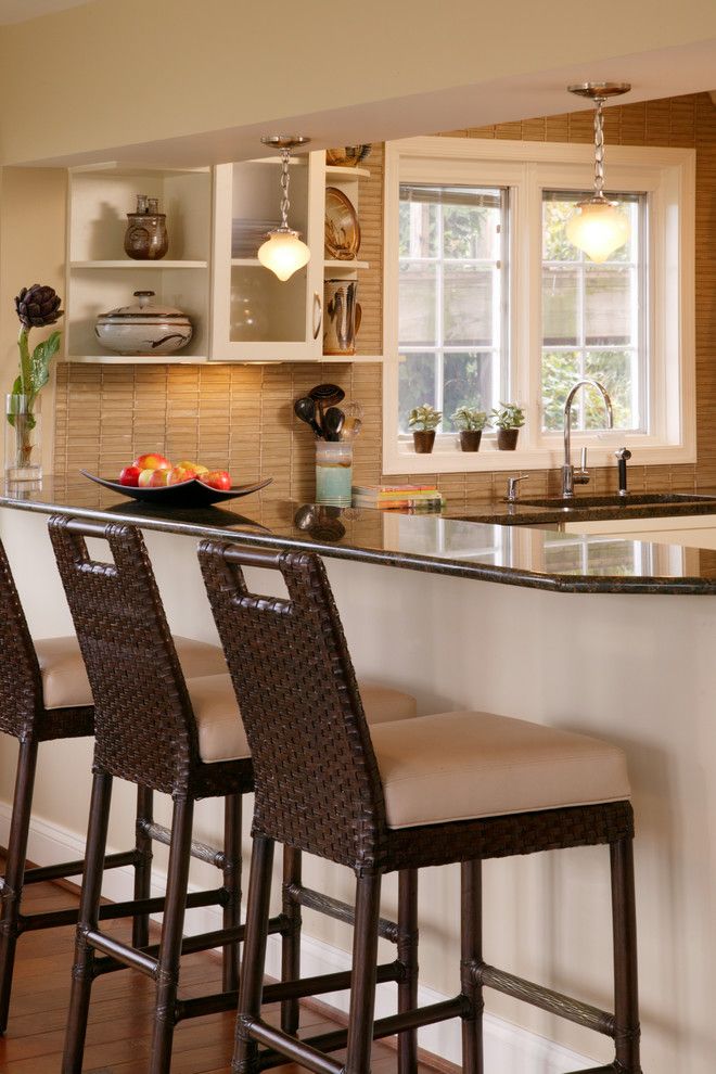 Oceanside Glass Tile for a Contemporary Kitchen with a Wood Flooring and Kitchen by Rachel Reider Interiors