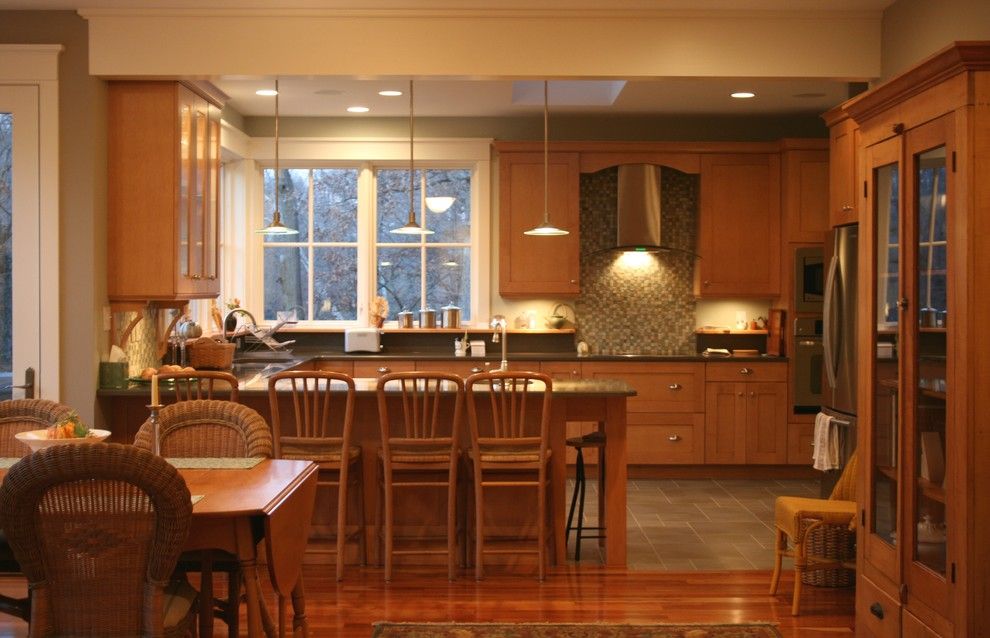 Oceanside Glass Tile for a Traditional Kitchen with a Ceiling Lighting and Custom Kitchen by Studio on Cedar Llc