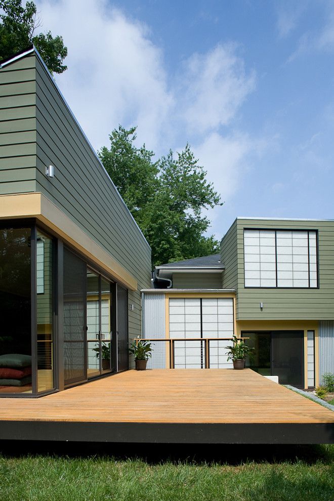 Ochre Color for a Transitional Exterior with a Kalwall and Fifties Split by Gardner Mohr Architects Llc