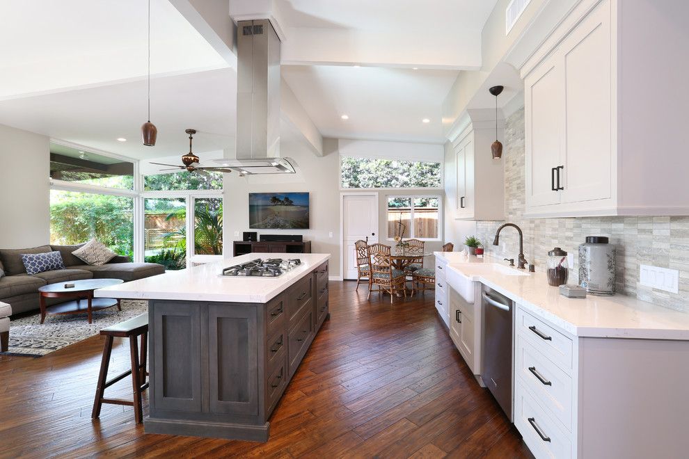 Omega Cabinetry for a Transitional Kitchen with a High Ceilings and 