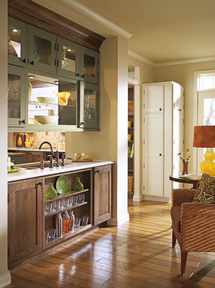 Omega Cabinets for a Rustic Kitchen with a Bar Area and Kitchen Cabinets by Capitol District Supply