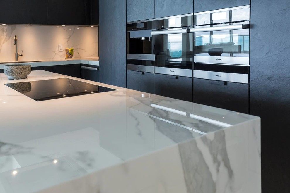 Omicron Granite for a Contemporary Spaces with a Condo and Luxury Miami Beach Project   Featuring Neolith and 2id Interiors by Omicron Granite & Tile