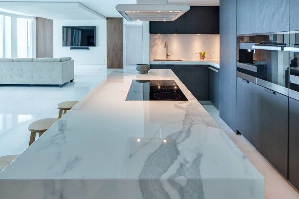 Omicron Granite for a Modern Spaces with a Pool and Luxury Miami Beach Project   Featuring Neolith and 2id Interiors by Omicron Granite & Tile