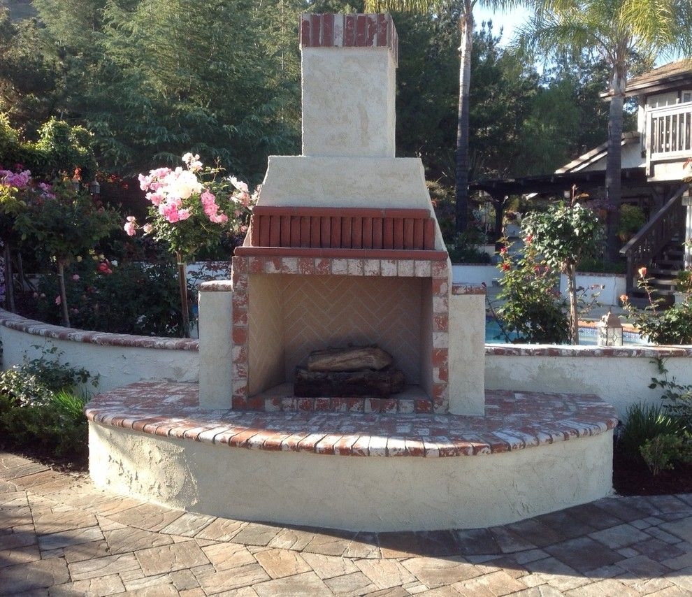 Orco Block for a Craftsman Patio with a Fireplace and Orco Fireplaces by Orco Block & Hardscape