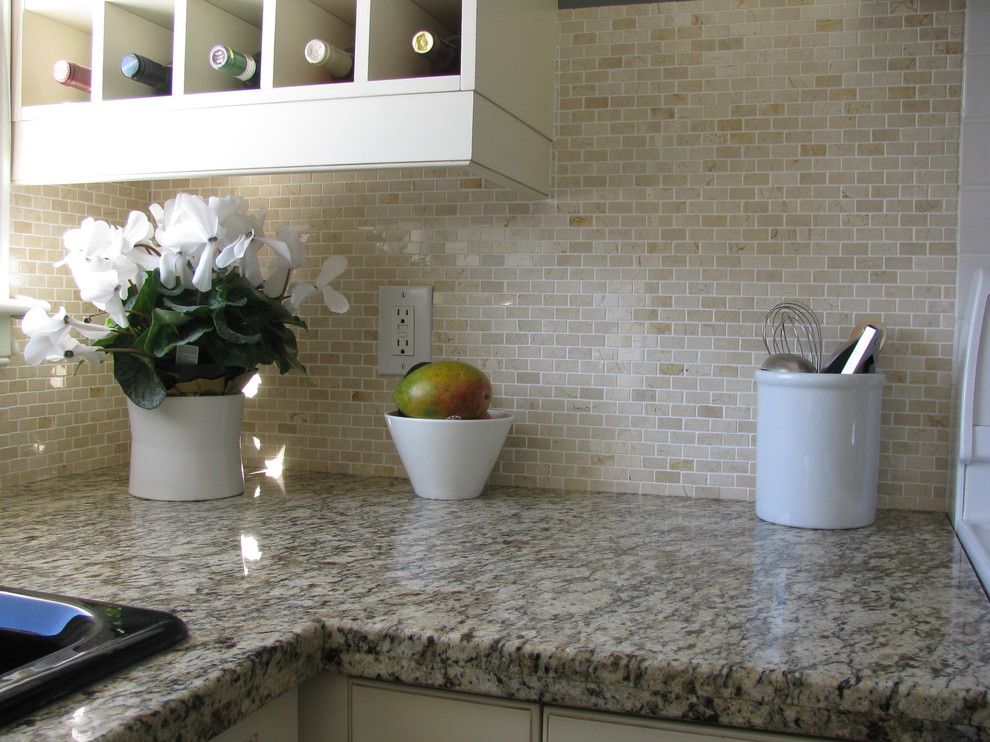 Oregon Tile and Marble for a Traditional Kitchen with a Black Cast Iron Sink and by Hardrock Construction by Hardrock Construction