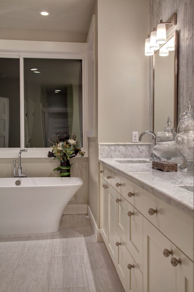 Oregon Tile and Marble for a Transitional Spaces with a Shaker Vanity Cabinet and Woodinville Retreat by Interiors