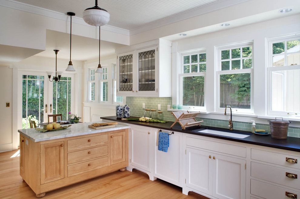 Oregon Tile and Marble for a Victorian Kitchen with a Black Granite Counter and Roanoke 4 Square by Gaspar's Construction