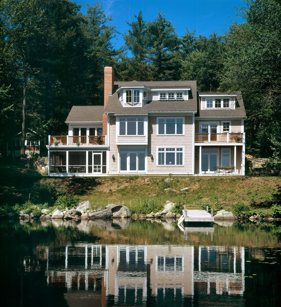 Oriel Window for a Beach Style Exterior with a Chimney and More Than Expected by Nashawtuc Architects, Inc.