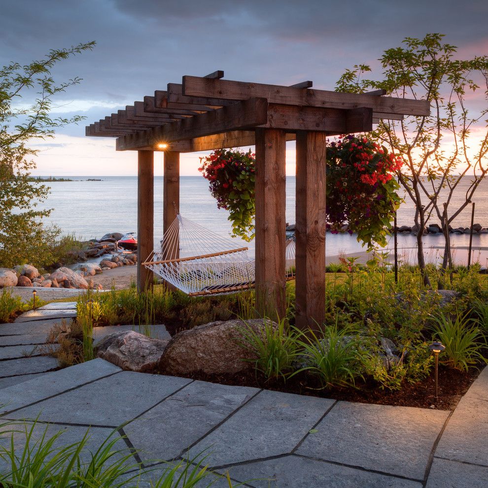 Padio for a Beach Style Patio with a Water View and the Landmark Group by Mcneill Photography