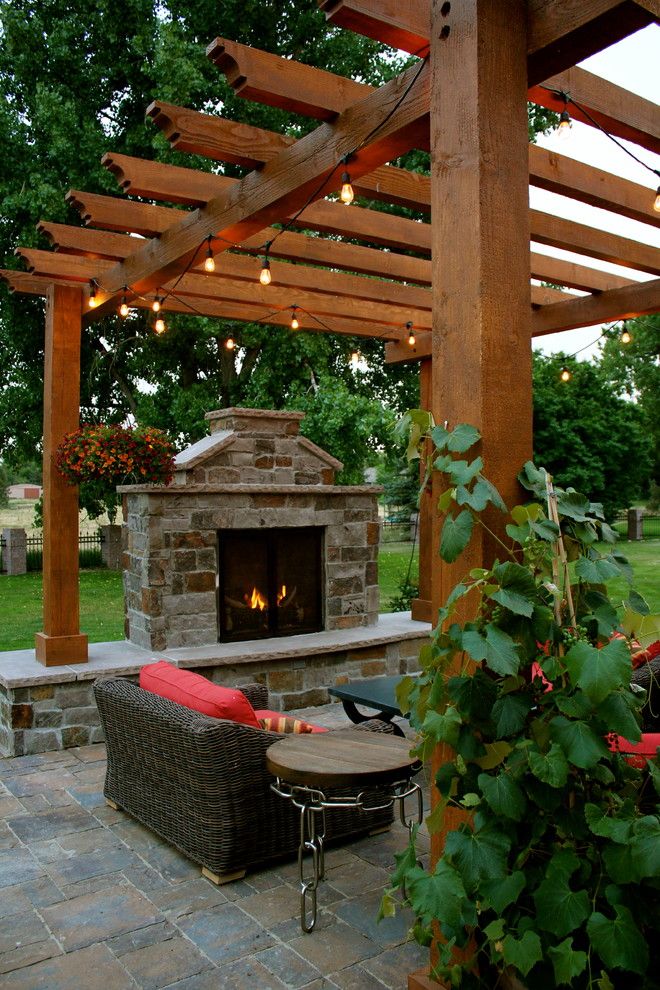 Padio for a Traditional Patio with a Backyard Retreat and Innovative Design by Innovative Design Co