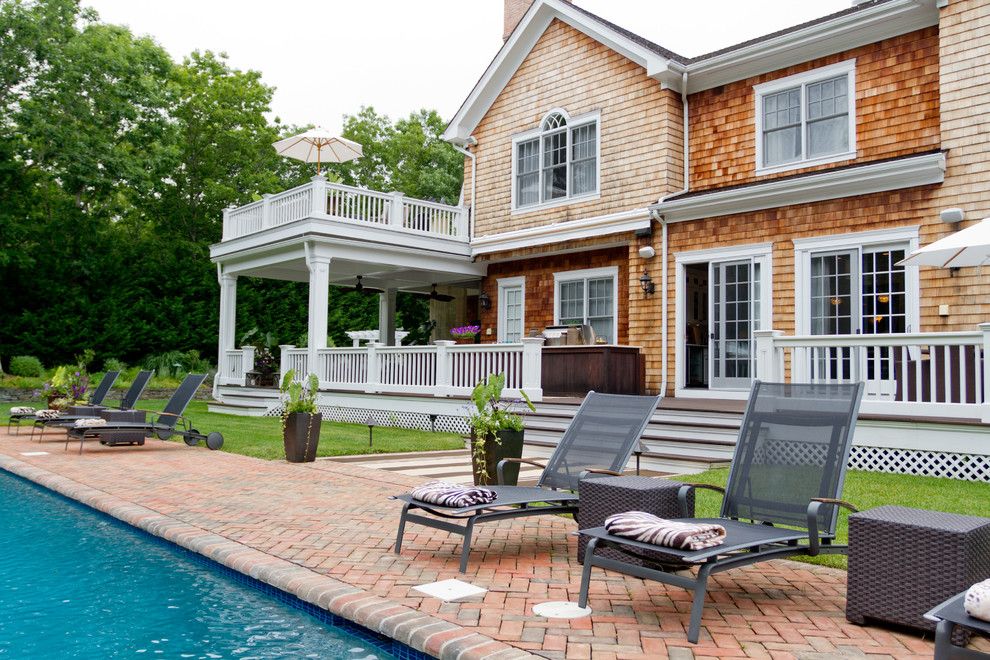 Palladian Window for a Traditional Exterior with a Brown Planters and My Houzz: Iris Dankner by Rikki Snyder