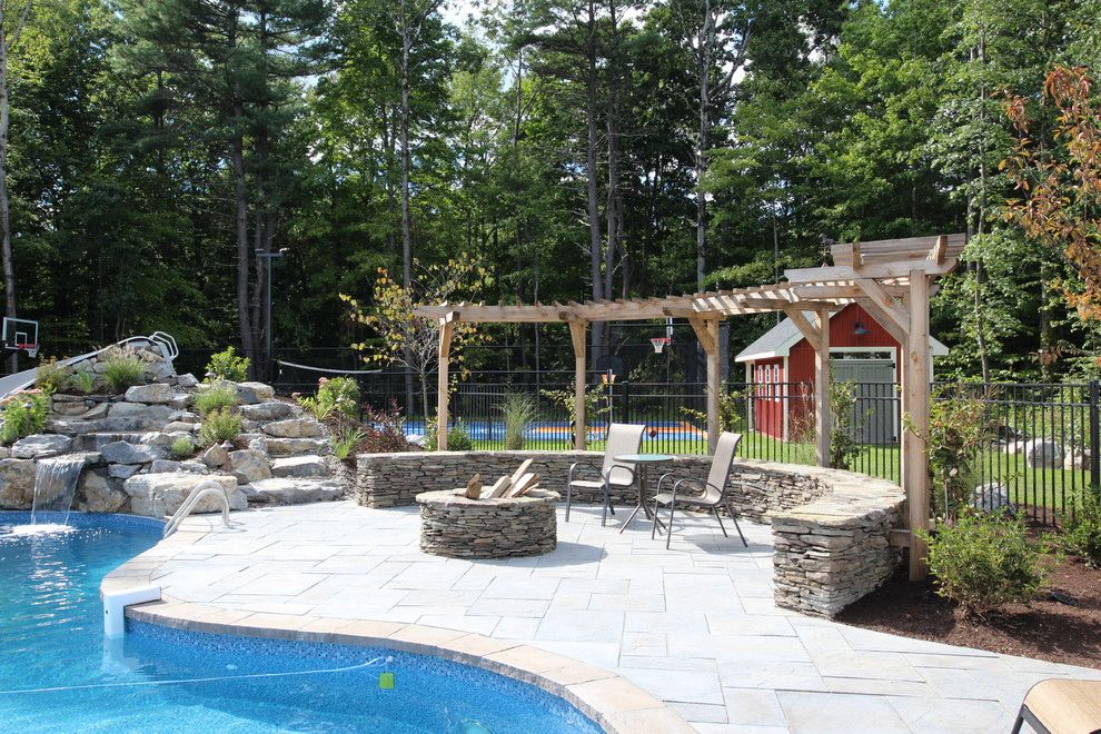 Pallet Shed for a Rustic Patio with a Fire Place and Outdoor Oasis by Flatbrook & Co