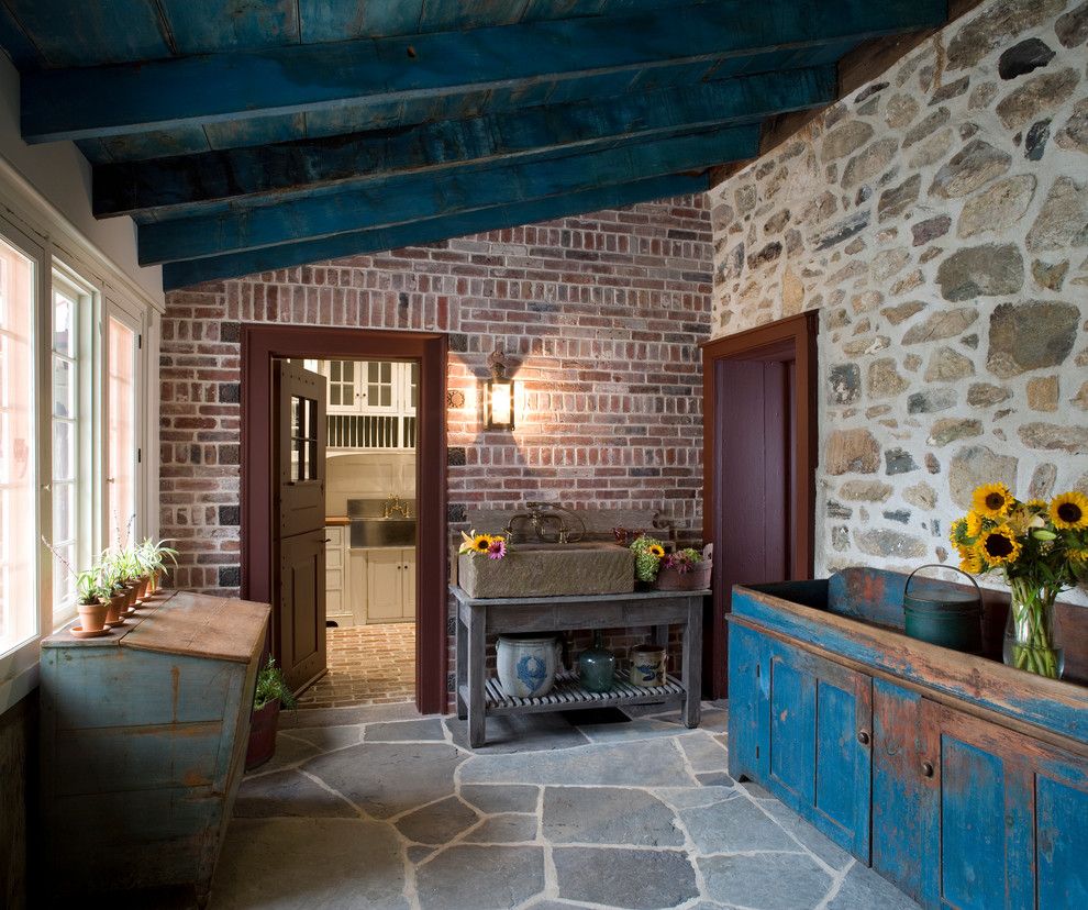 Pallet Shed for a Rustic Porch with a Brick Wall and Additions and Renovation   Oley, Pa by Peter Zimmerman Architects