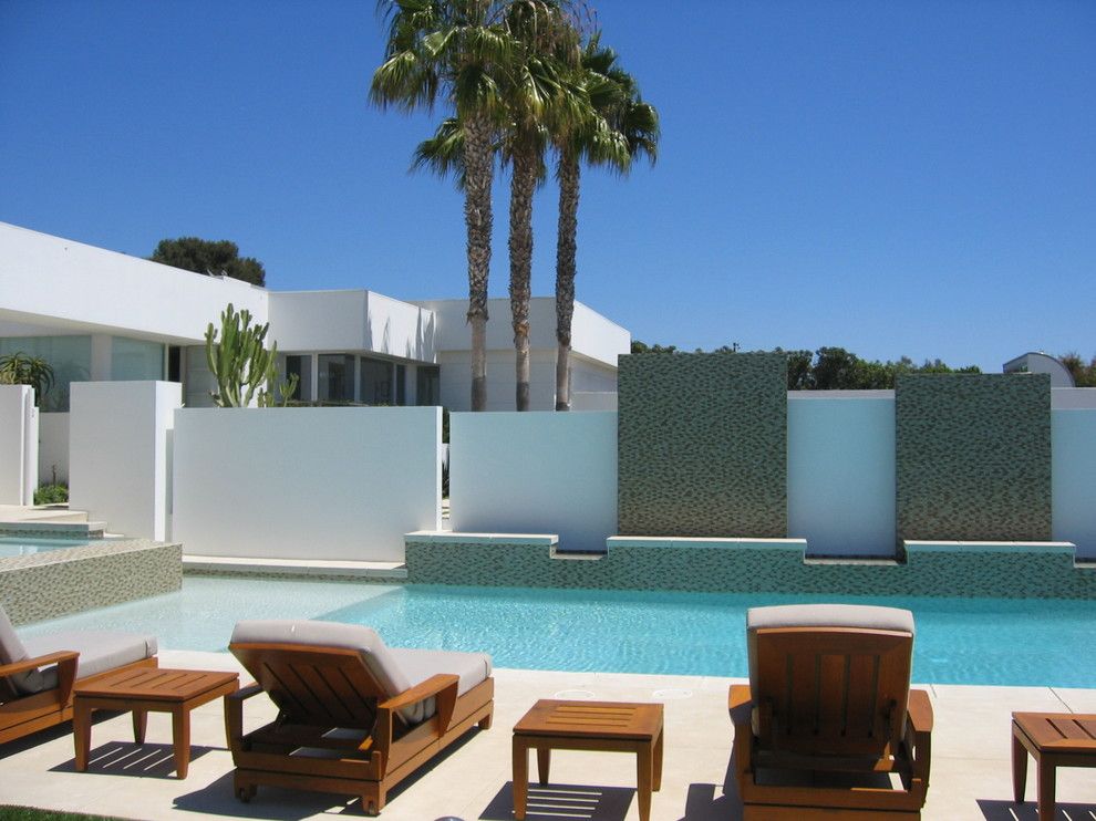 Parapet Wall for a Modern Pool with a Flat Roof and Malibu Residence by Sage Design Studios, Inc.