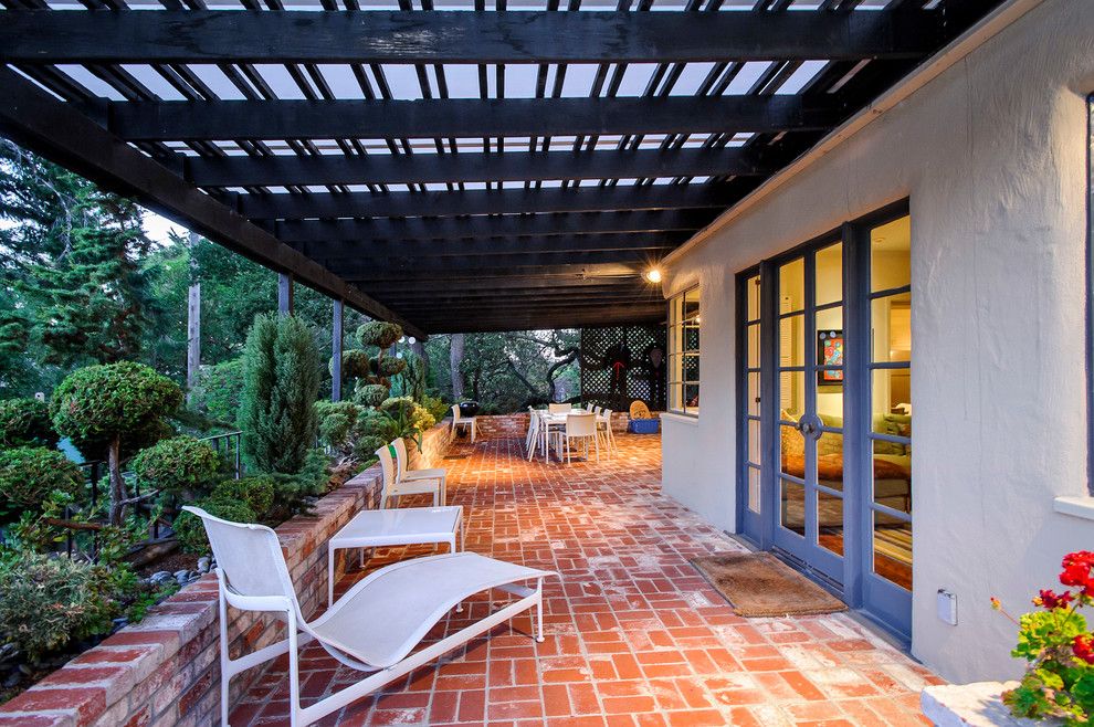Paver Patterns for a Traditional Patio with a French Doors and Jackling Drive by Dennis Mayer, Photographer