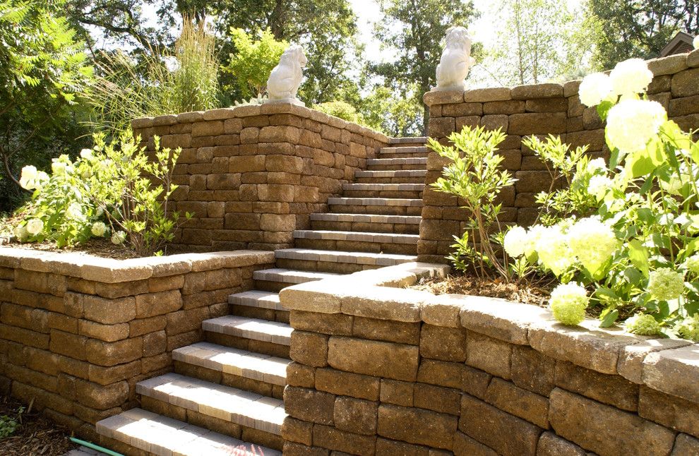 Paver Steps for a Traditional Landscape with a Stone Wall and Retaining Walls by Scenic Specialties