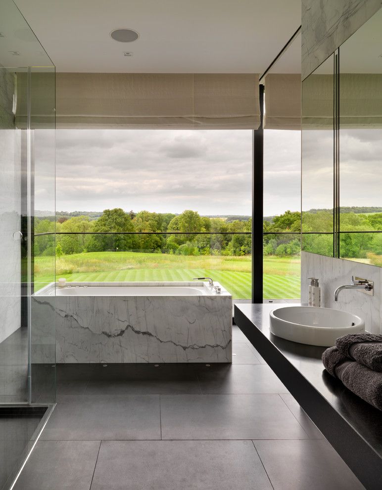 Peabody Building Supply for a Contemporary Bathroom with a Floating Vanity and Gregory Phillips by Gregory Phillips Architects