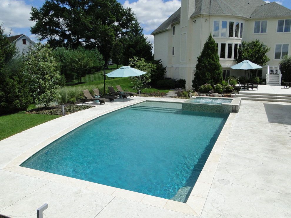 Pebble Sheen for a Contemporary Pool with a Infinity Spa and Contemporary Elements   Collegeville, Pa by Armond Aquatech Pools