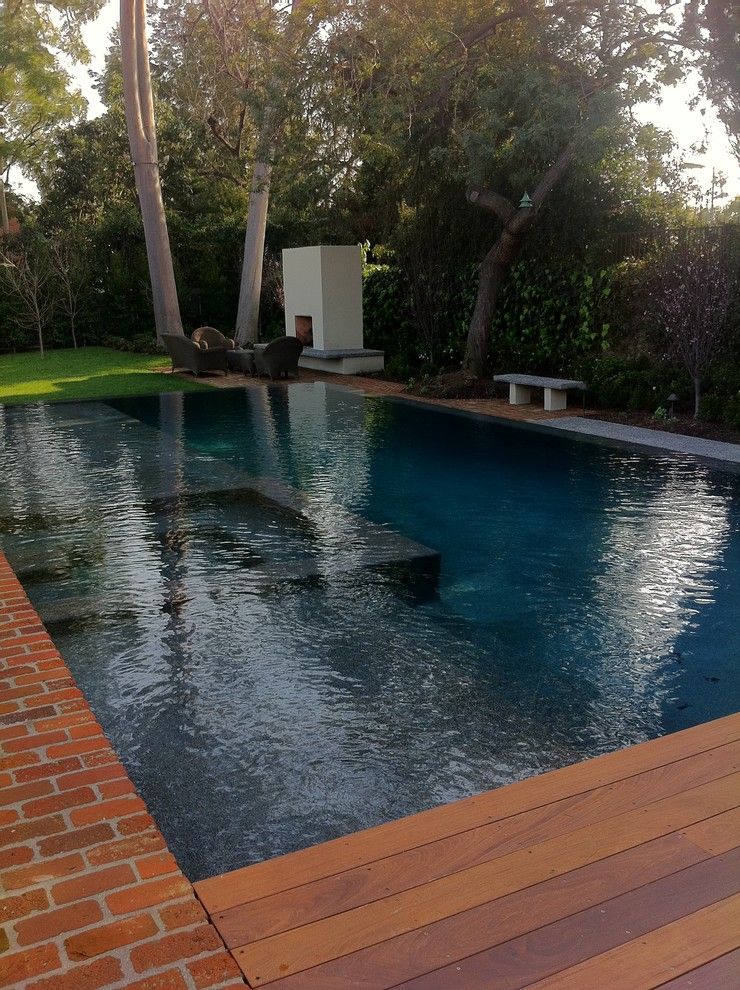 Pebble Sheen for a Contemporary Pool with a Pebble Sheen Ocean Blue Rollover Bond Be and Ocean Blue Pebble Sheen by M Preciado Pool Plastering