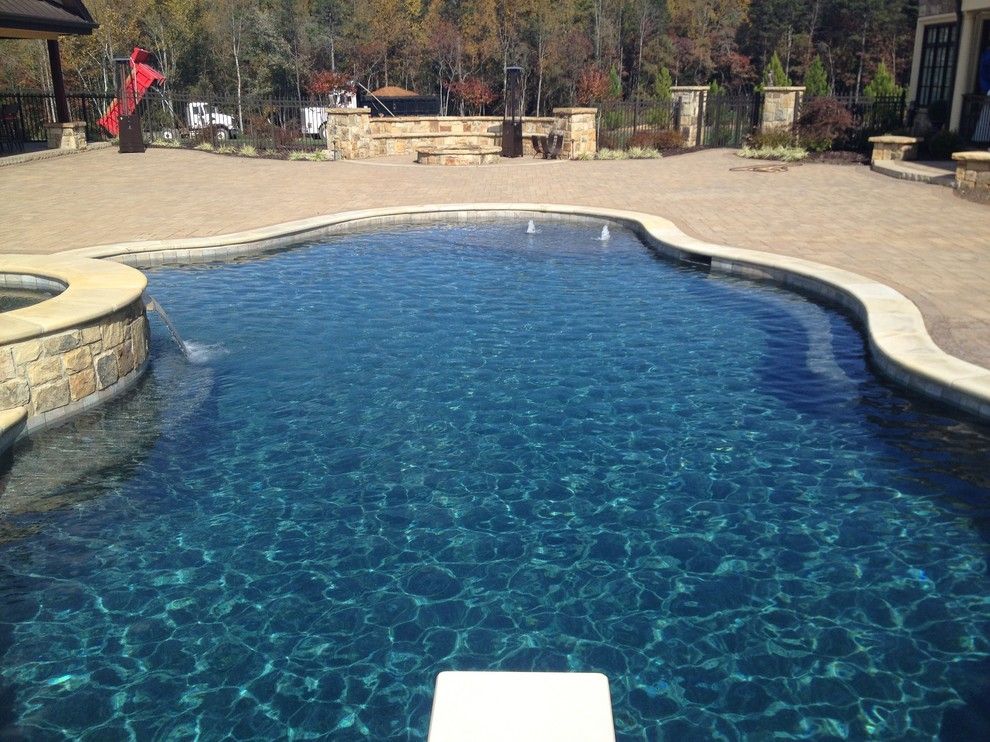 Pebble Sheen for a Mediterranean Pool with a Pebble Sheen and Ocean Blue Pebble Sheen by Vue Custom Pools