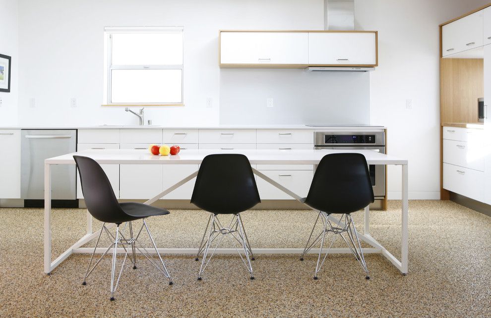 Pebbletec for a Modern Kitchen with a White Dining Table and Kitchen by Ras A, Inc.