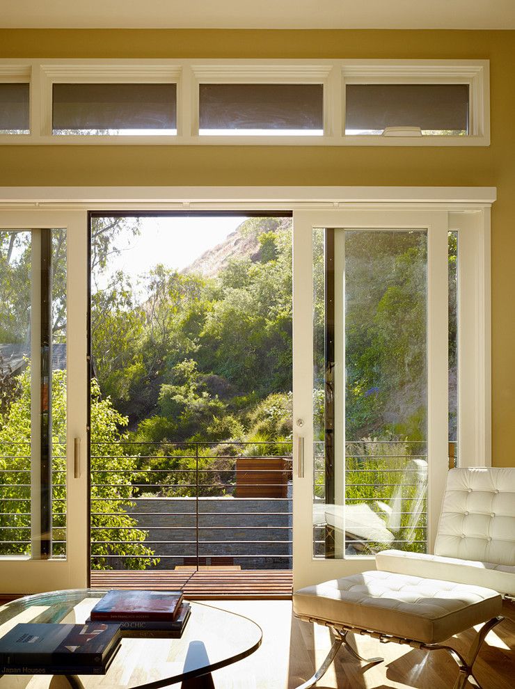 Pella Windows and Doors for a Traditional Living Room with a Glass Doors and Cole Valley Hillside   John Maniscalco Architecture by John Maniscalco Architecture