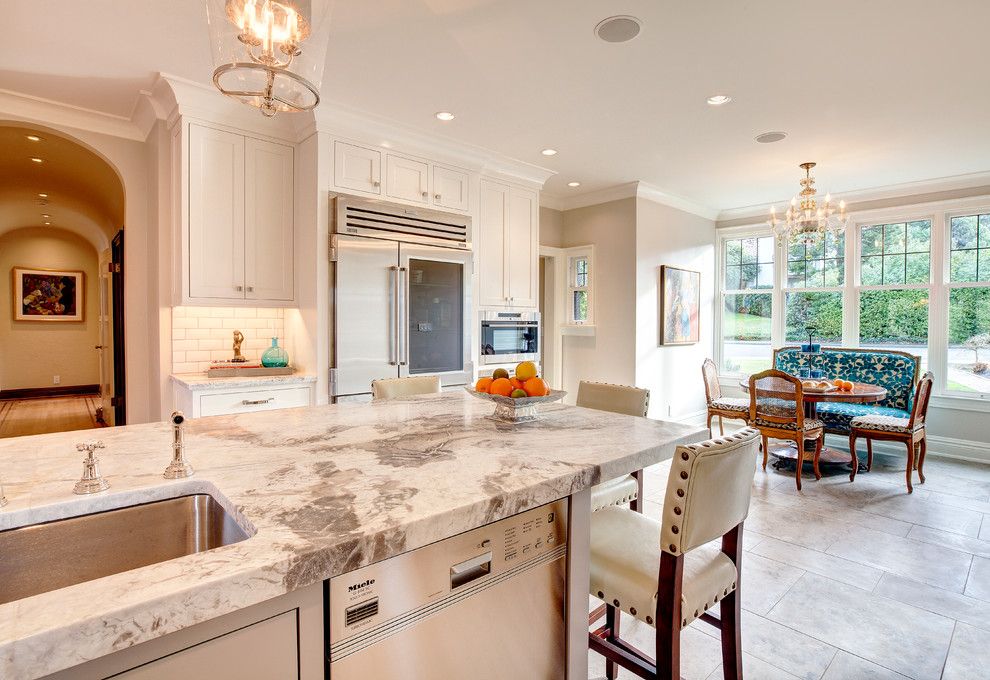 Pental for a Transitional Kitchen with a White Cabinets and Seattle Kitchen Remodel by Beverly Bradshaw Interiors