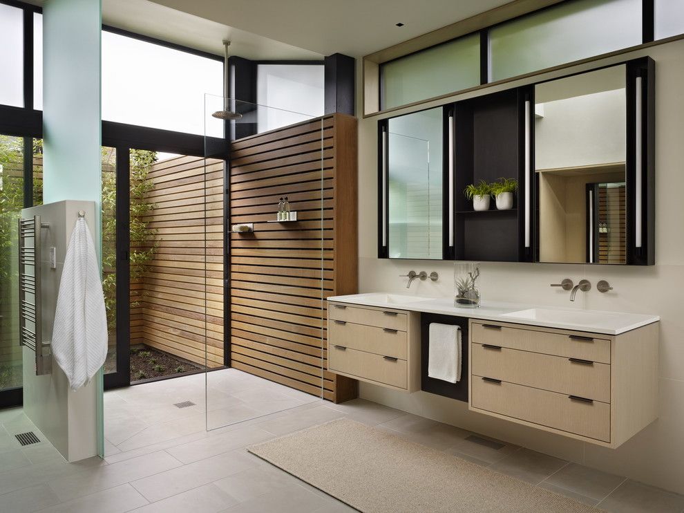 Pental Tile for a Modern Bathroom with a Floating Vanity and Hillside Modern by Deforest Architects