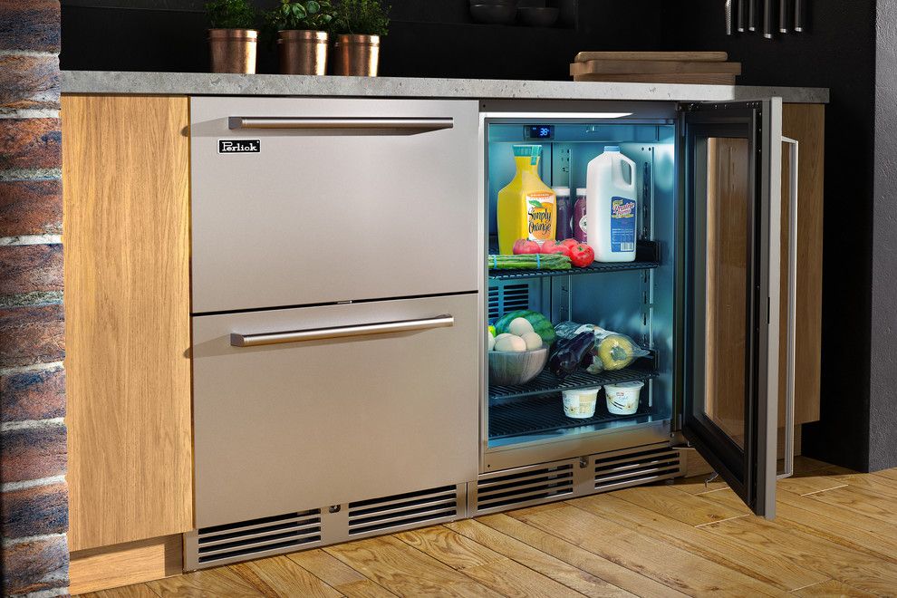 Perlick for a  Spaces with a Compact Refrigerator and Downtown Industrial Loft Kitchen by Perlick