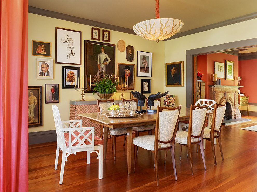 Persimmon Color for a Eclectic Dining Room with a Paintings and Home by Jeffers Design Group