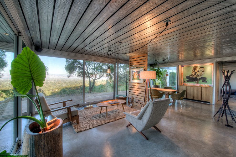 Philip Johnson Glass House for a Industrial Living Room with a Green Dining Chair and Modular Glass Guest House by Canyon Construction