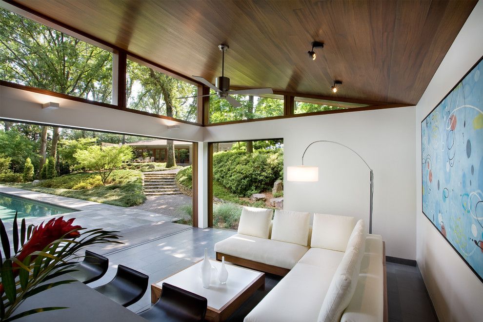 Philip Johnson Glass House for a Modern Patio with a Wood and Nancy Creek Guesthouse and Pool by Philip Babb Architect