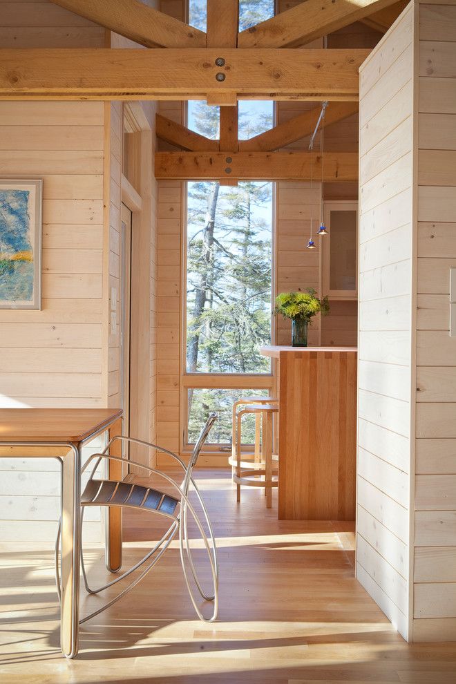 Pine Creek Structures for a Rustic Dining Room with a Tall Windows and Dining and Kitchen by Whitten Architects