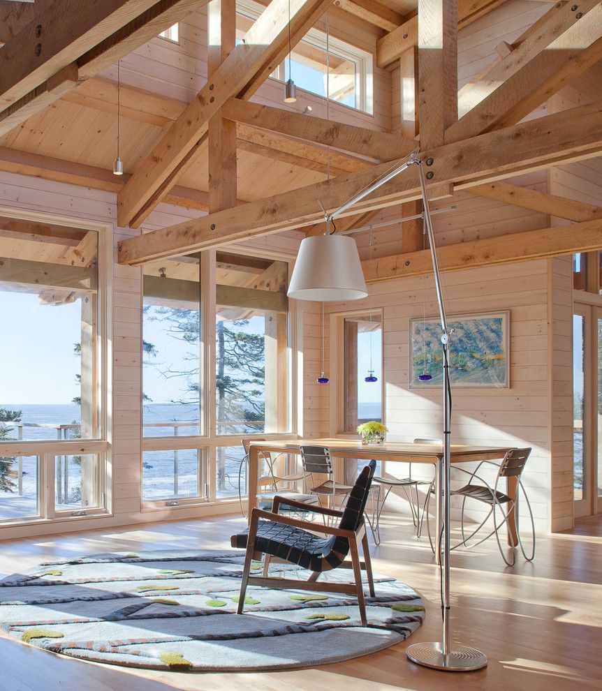 Pine Creek Structures for a Rustic Living Room with a Floor Lamp and Living and Dining by Whitten Architects