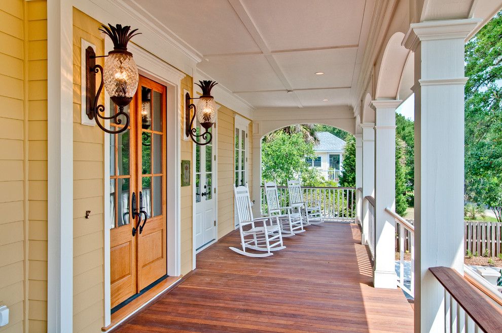 Pineapple Symbolism for a Beach Style Porch with a Beach Style and Front Porch by the Middleton Group