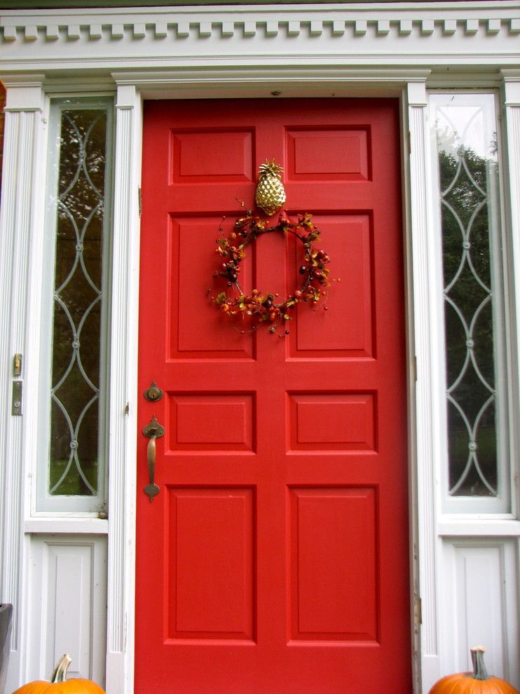 Pineapple Symbolism for a Traditional Exterior with a Traditional and Red Front Door with Pineapple Knocker by Threeboys