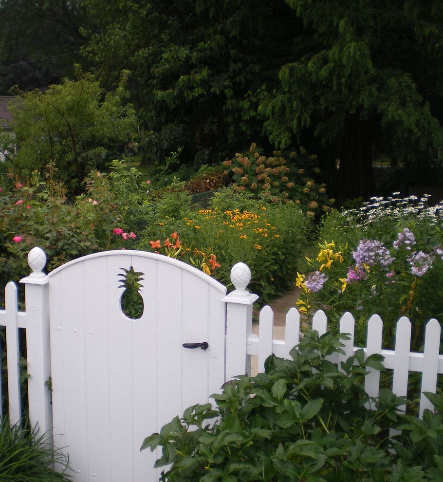 Pineapple Symbolism for a Traditional Landscape with a Gate and Details by Wallace Landscape Associates