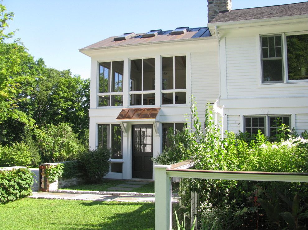 Plexi Craft for a Contemporary Porch with a Open Concept and Chatham Transformation by Flatbrook & Co