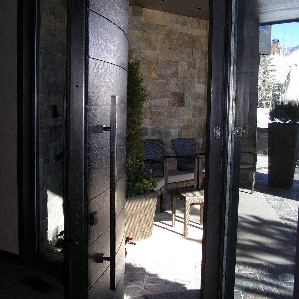 Plummers Furniture for a Contemporary Entry with a Black Door and Plummer Photos by Timothy F. White